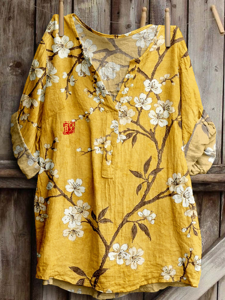 黄色い花柄のゆったりシャツ